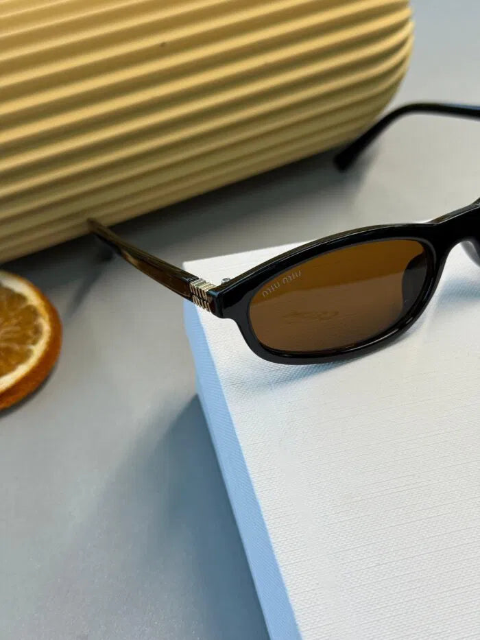 Miu Miu Tortoise Oval Güneş Gözlüğü – Kahverengi