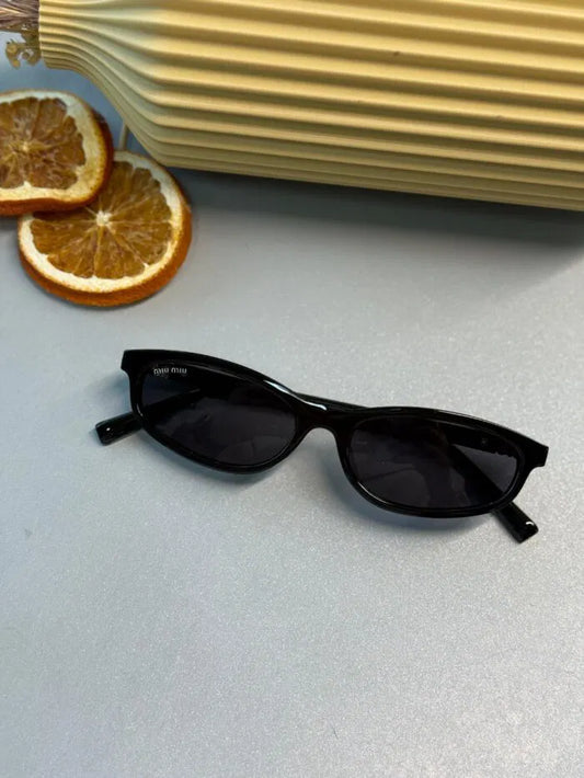 Miu Miu Tortoise Oval Güneş Gözlüğü – Siyah