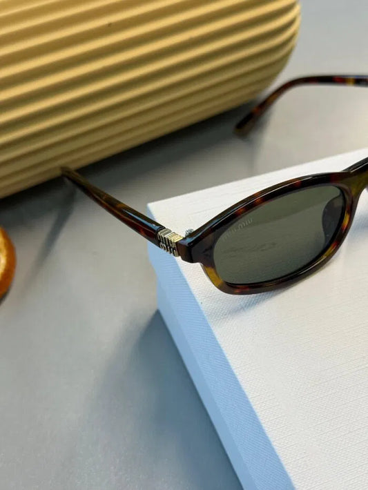 Miu Miu Tortoise Oval Güneş Gözlüğü – Leopar Kahve