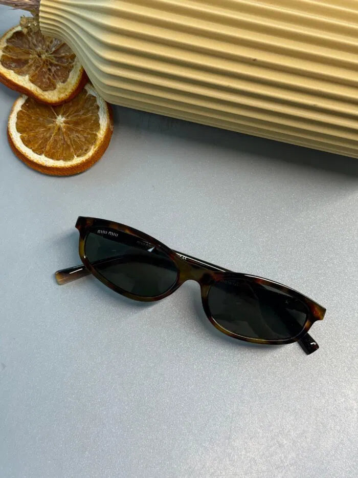 Miu Miu Tortoise Oval Güneş Gözlüğü – Leopar Kahve