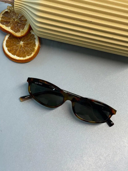 Miu Miu Tortoise Oval Güneş Gözlüğü – Leopar Kahve