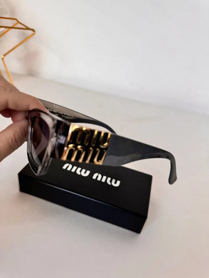 MIU MIU MU 10WS 1AB5D1 Gri  Güneş Gözlüğü